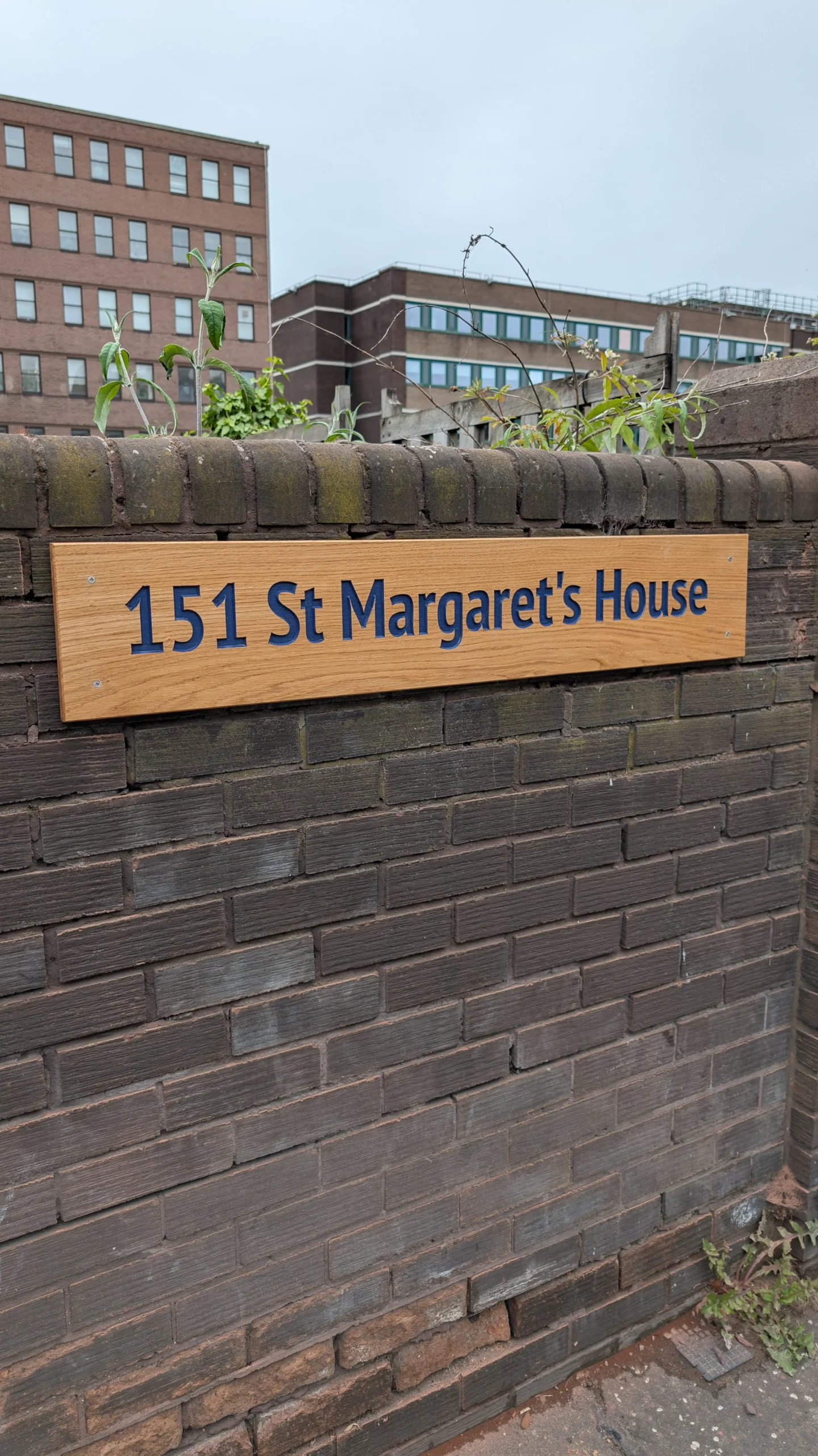 Bespoke wooden address sign handcrafted in Edinburgh, laser-engraved on solid hardwood.